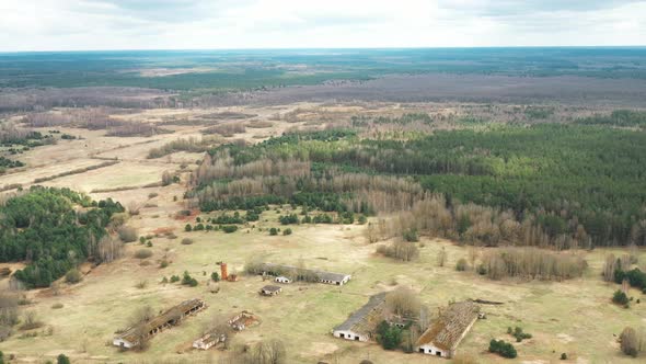 Belarus. Aerial View Of Abandoned Ruined Water Tower Near Farm In Chernobyl Zone Chornobyl