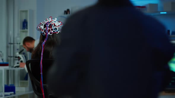 Back View of Woman Patient Wearing Performant Eeg Headset alt