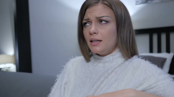 Arguing, Angry Talking Woman Sitting on Side of Bed alt