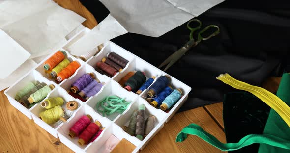 Step by step, Woman dressmaker making sewing patterns, alt