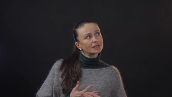 Hesitating Thoughtful Lady with Ponytail Looks Up Pondering