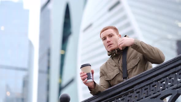Handsome Serious Beauty Male Model Closeup Portrait Young Guy in the City Street alt