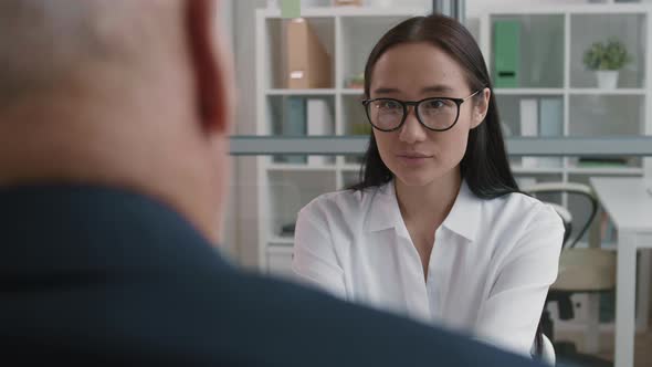 Smart Asian Candidate Interviewed for Job alt