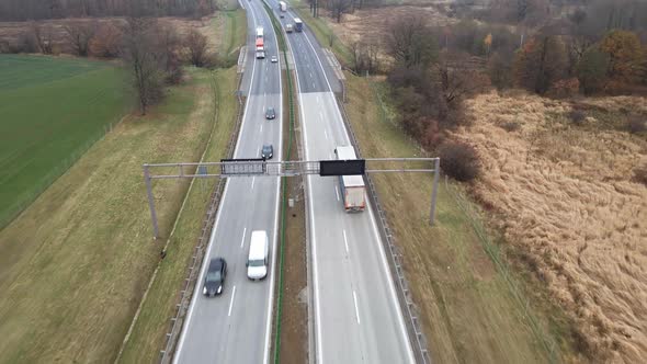Cars Moving on Highway Aerial View alt