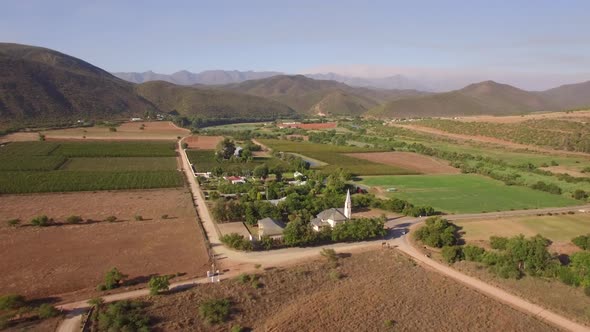 Aerial travel drone view of Oudtshoorn, Western Cape, South Africa. alt