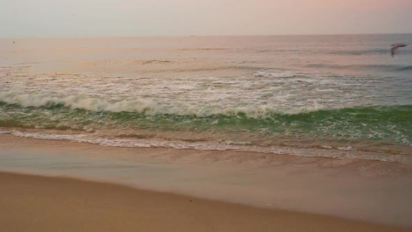 Blue water ocean wave blue swells crashing curling breaking a wavy surface close up alt