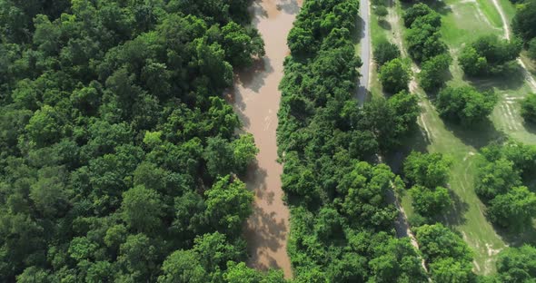 Birdseye view of the Buffalo Bayou and surrounding area in Houston, Texas. This video was filmed in alt