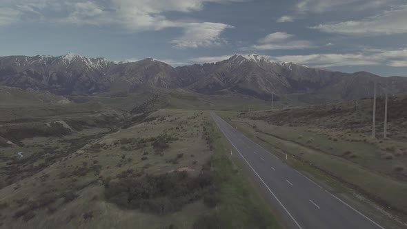 Empty road in Southern Alps aerial