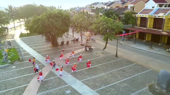 Sportsmen in Red and White Dresses Train for Performance alt