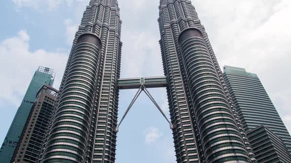 Petronas Twin Towers with Fast Flying Clouds Time-lapse Kuala Lumpur Malaysia alt