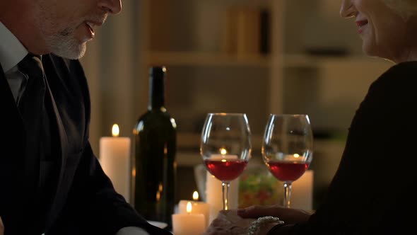 Business Partners Discussing News or Affairs at Dinner, Inofficial Meeting alt