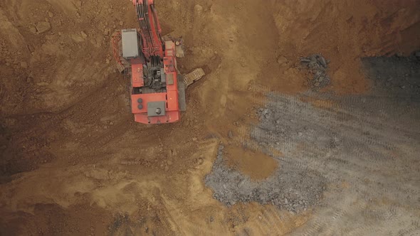 Aerial Shot of a Hyperlapse Excavator Digging alt