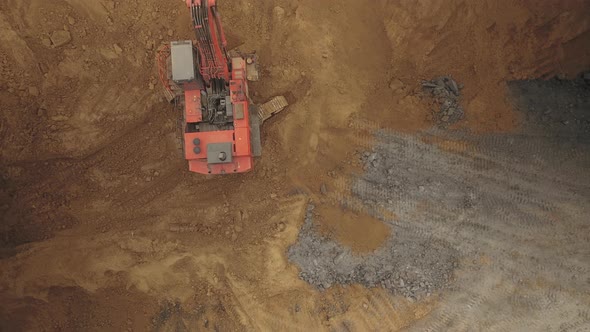 Aerial Shot of a Hyperlapse Excavator Digging