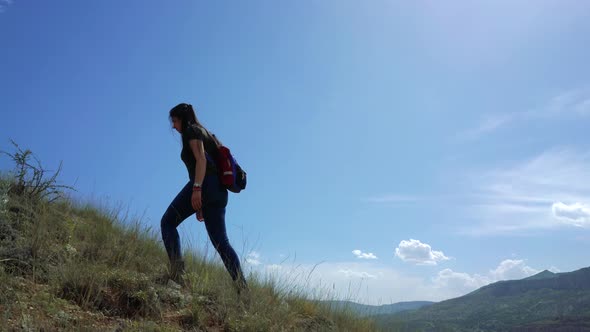 Girl Walking In The Mountain alt