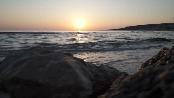 Sunriset Reflection on the Waves and Sand