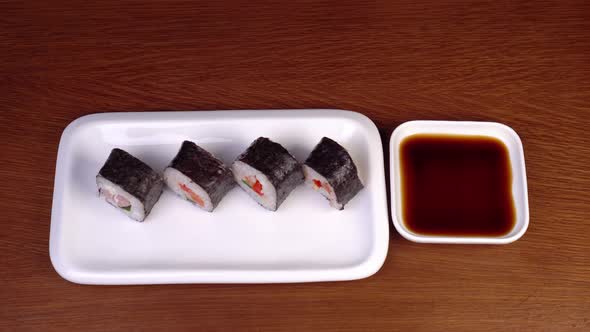 Sushi Rolls Are Eaten with Chinese Chopsticks