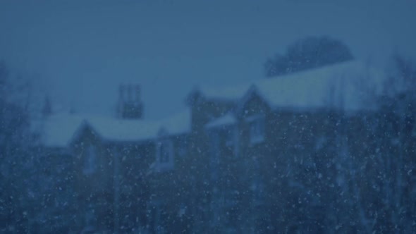 Snowflakes In Focus With House In Background In The Evening alt