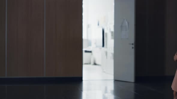 Worried Little Schoolgirl Stop in School Hallway Alone alt
