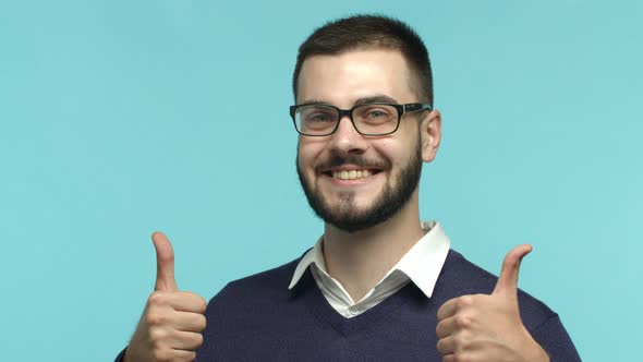 Slow Motion of Fully Satisfied Businessman in Glasses Giving Permission Showing Thumbs Up Gesture