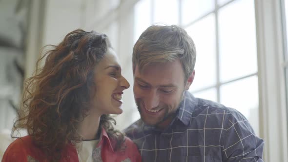 Couple working on project together alt