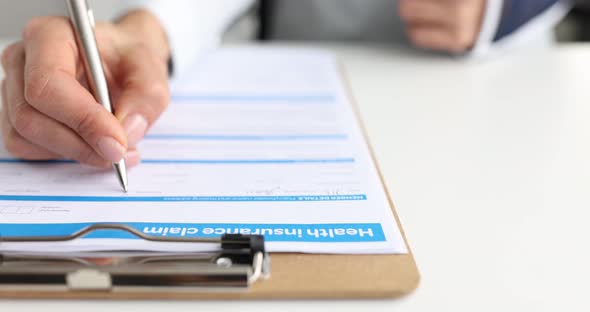 Manual Submission of Health Insurance Application Form Slow Motion  Movie alt