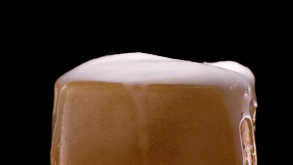 Light Beer Pouring in Glass