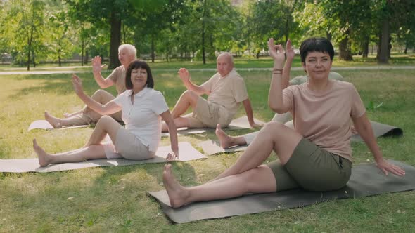 People Practicing Yoga Outdoors alt