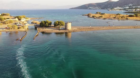 Aerial View of a Motor Boat in a Deep Blue Colored Sea. Kolokitha Island, Crete, Greece