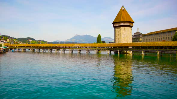 Chapel bridge spanning the river Reuss in the city of Lucerne, Switzerland. alt