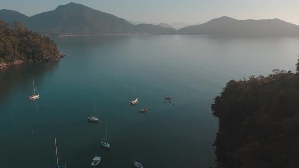 Drone video - Aerial - Drone opening view of boats and beach