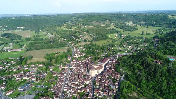 Village of Saint-Cyprien in Perigord in France seen from the sky alt