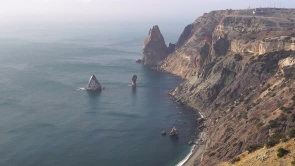 Snowy Winter Morning Over Sea Landscape and Volcanic Rocky Coastline alt
