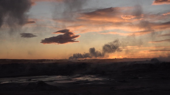 Iceland. Geothermal region area valley with smoking fumaroles and hot streaming water from geysers. alt