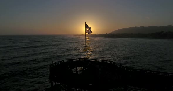 American flag close up at sunset on the Ventura Pier