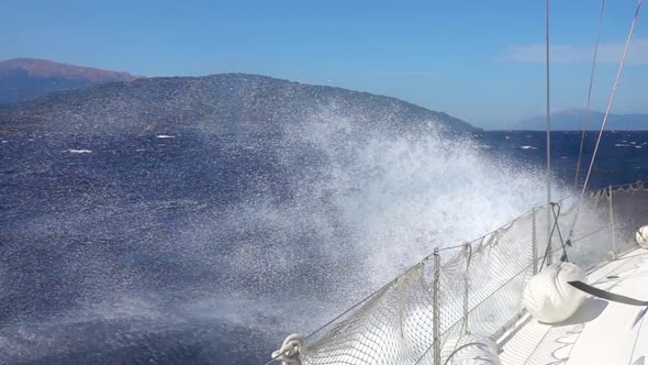 Water Dust Near a Sailing Yacht