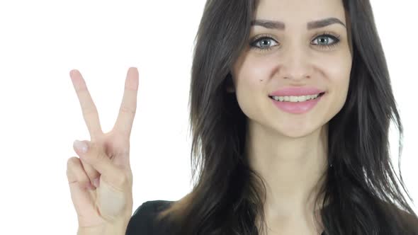 Woman Showing Victory Sign, White Background alt