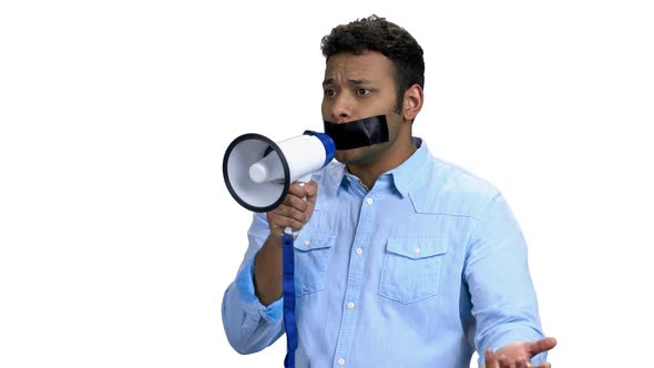 Young Angry Man with Taped Mouth Can Not Speak alt