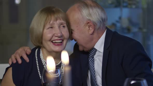 Senior Man Flirting with Elderly Woman alt