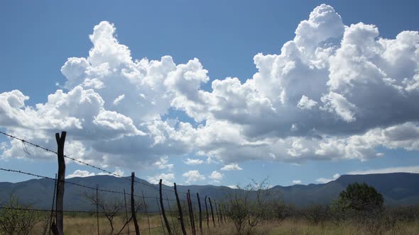 Cumulus Clouds Over Rural Scene Zoom In Timelapse