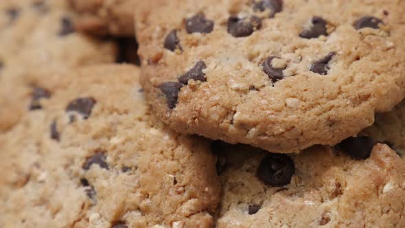 Shallow DOF chip cake cookies with chocolate pieces close-up 4K 2160p 30fps UHD tilting  footage - P alt