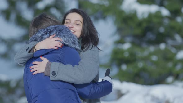Two girls hugging alt