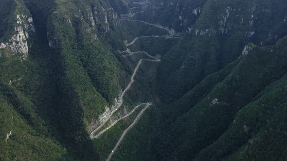 Serpantine Road in Mountain Gorge with Green Forest