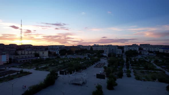Pink Sunset Over a Small Town alt