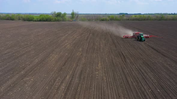 Tractor With The Seeder At The Field 3 alt