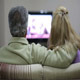 Couple Sitting Together On Sofa, Watching TV - VideoHive Item for Sale