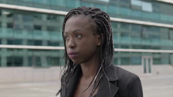 confident attractive american african businesswoman smiling at camera alt