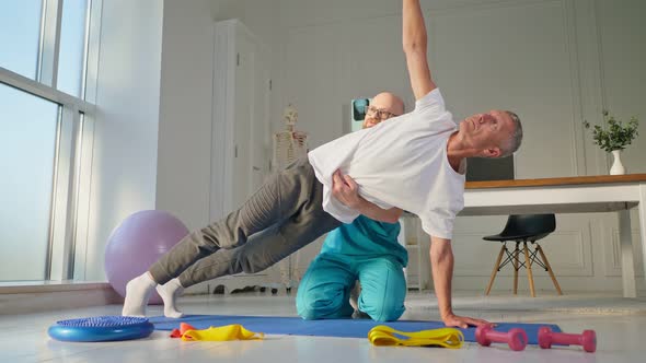 Back Health. A Мan Performs Back Exercises, Which Restore Physical Functions alt