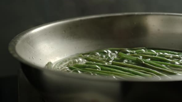 Green Beans Boiling In A Metal Pot In The Kitchen