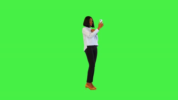 African American Girl Talking on Video Call Start Taking Selfie Photo on Smartphone Blogger Posing