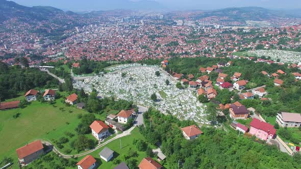 Flying over Bosnian town with Muslim graveyards alt
